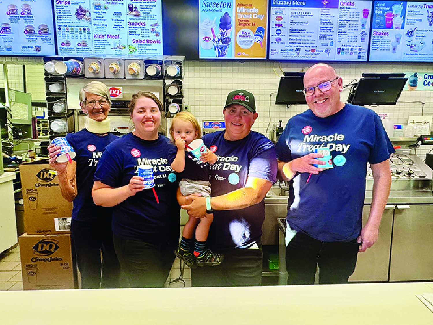 Joanne, Heather, Woodrow, and Morgan Kerr with DQ Moosomin, and Moosomin-Montmartre MLA Kevin Weedmark during Miracle Treat Day on August 14 in Moosomin.